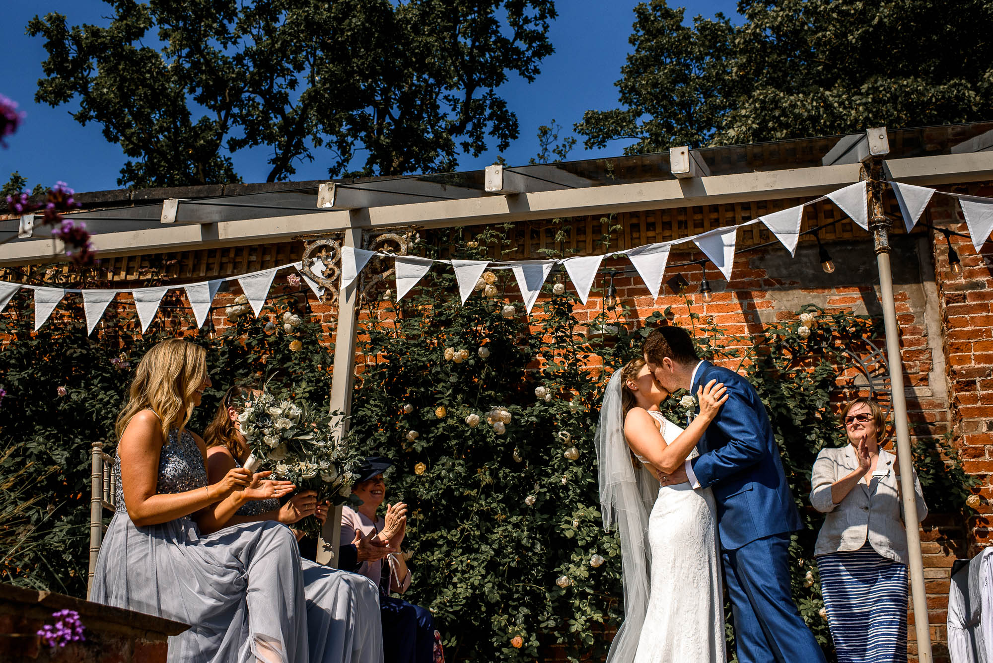 First kiss beneath the Loggia at Beeston Fields